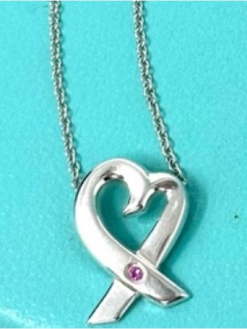 Authentic Tiffany & Co. Poma Picasso 1P Sapphire Open Loving Heart Necklace.